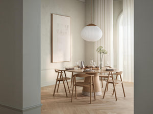 Bolia Piro eettafel Ø125 cm Sand Travertine geolied eiken